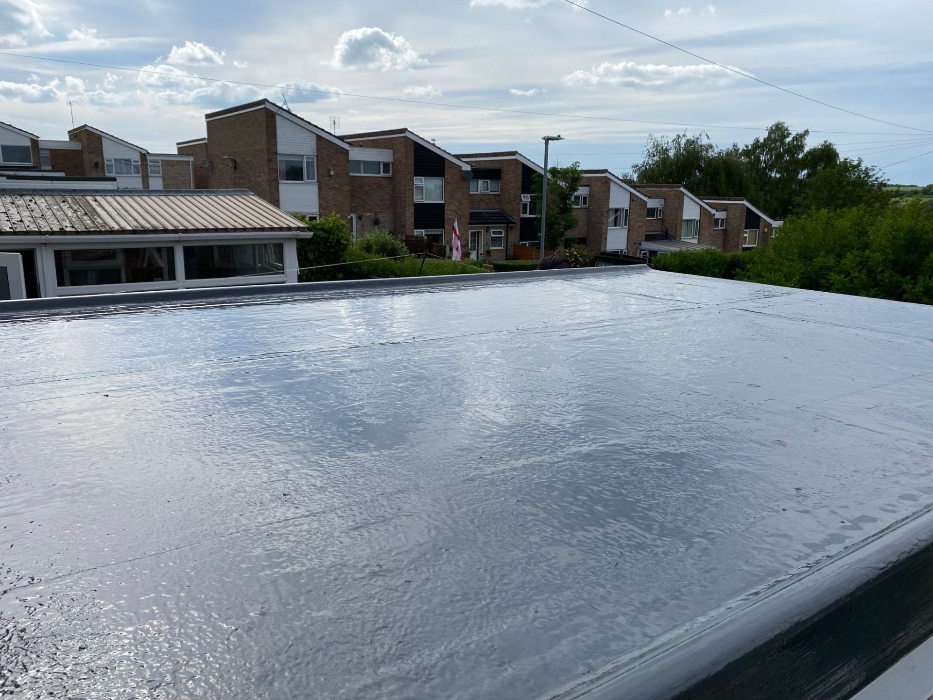 Finished GRP fibreglass flat roof installation over a garage in Nottinghamshire