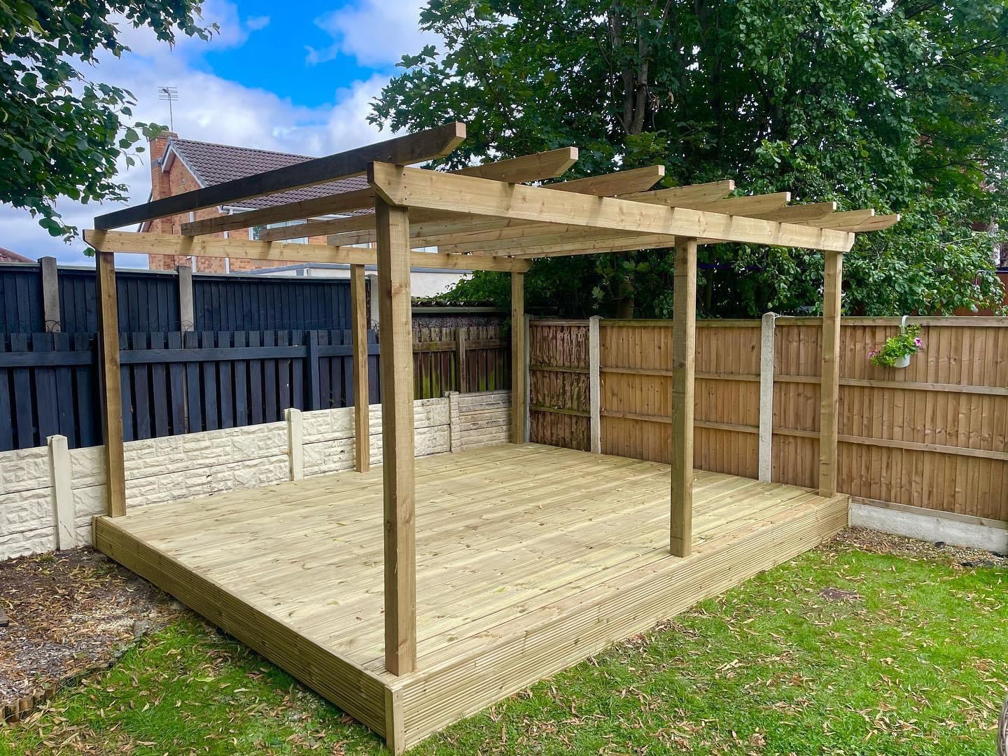 Freestanding timber gazebo on a back garden lawn in Nottinghamshire